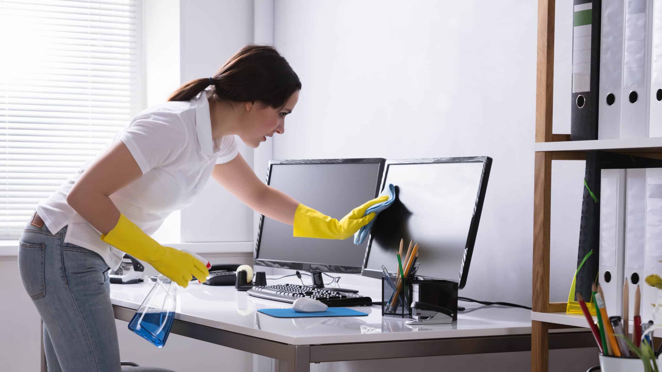 computer monitor being cleaned.