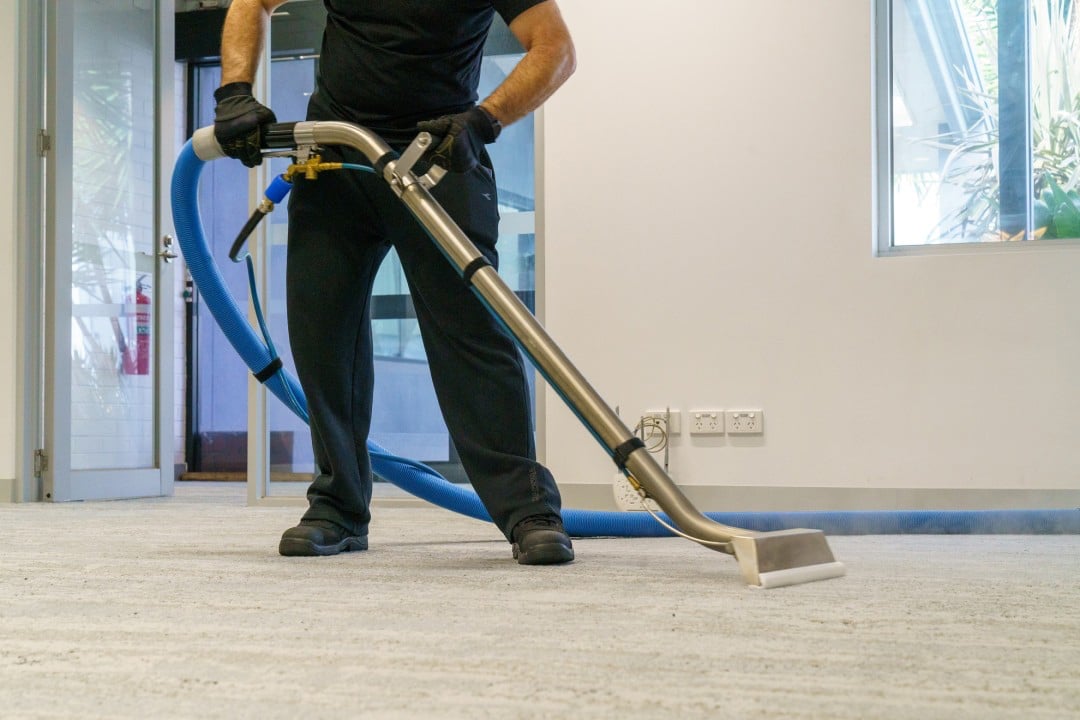 hoovering a carpet.