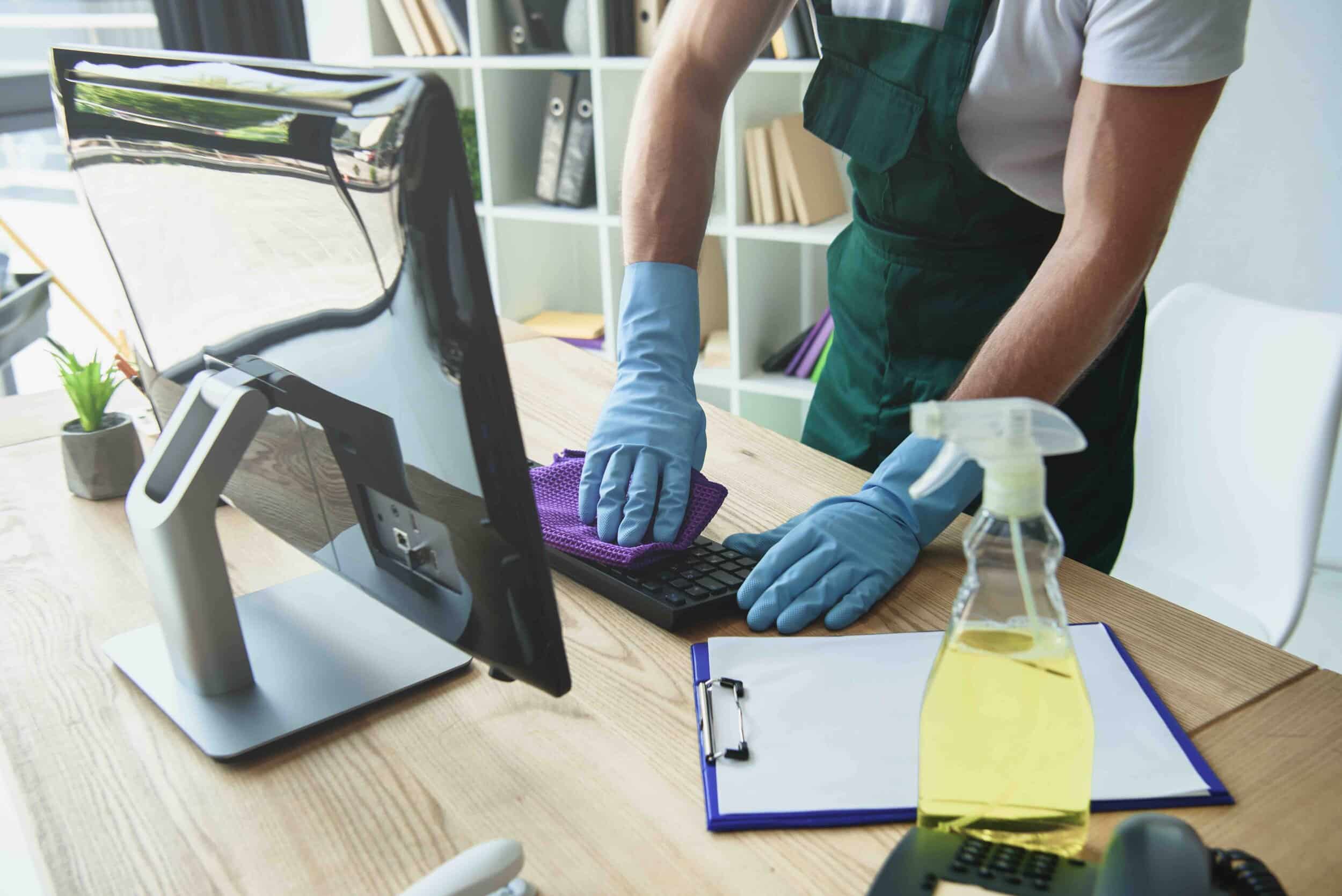 computer keyboard being cleaned.